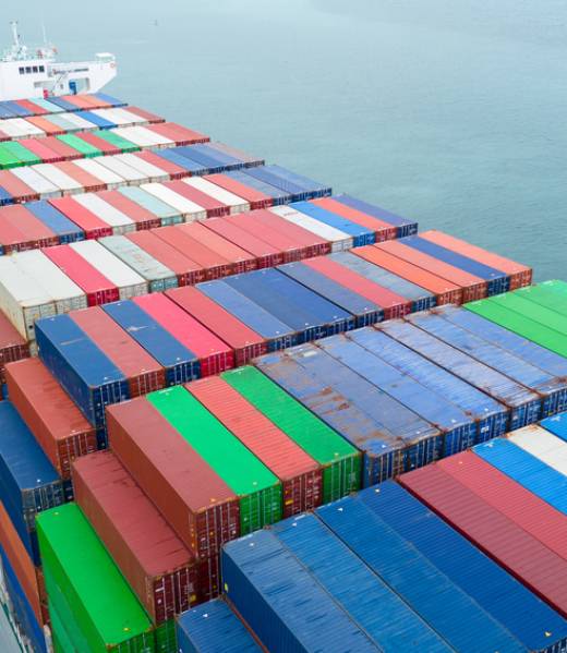 MEWZ7US Front of Cargo container ship carrying container and running in international container port customs shipyard sea port concept smart logistic service. side Container Ship.